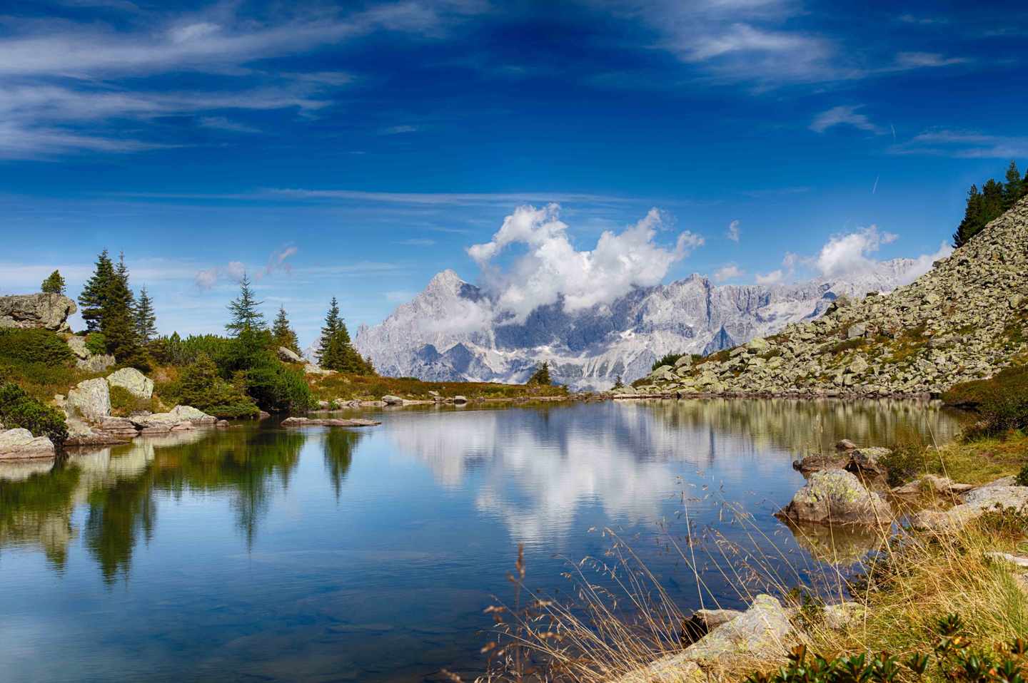 oesterreich-schladming-panorama-berge-see-g-1040911704.jpg