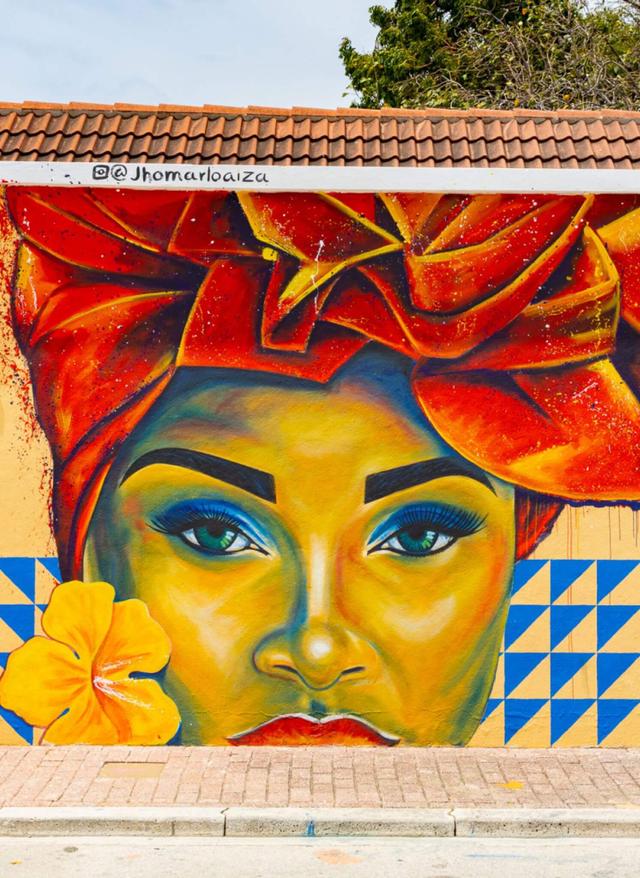 Willemstads Sehenswürdigkeiten curacao-willemstad-streetart-frau-curacaotouristboard.jpg