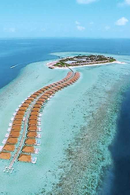 blt35e5d9039b29baa1-malediven-lhayiyani-atoll-huravalhi-hurawalhi-island-resort-luftaufnahme-insel-DER_MLE14117-IO_S22_3-f-indischer-ozean.jpg Wasserbungalows auf dem Meer aus der Vogelperspektive